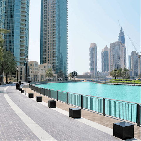 Stroll along the Dubai Marina promenade and admire the cityscape