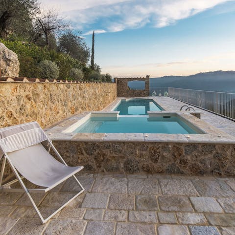 Watch a Tuscan sunset from the pool or Jacuzzi