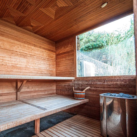 Relax and unwind in the private sauna