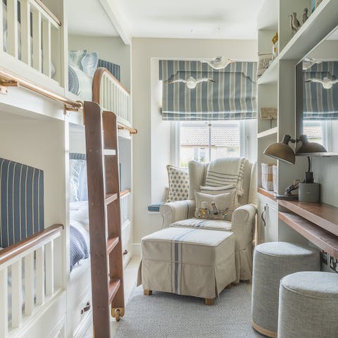 Tell tales of pirates and buried treasure in the nautical children's room