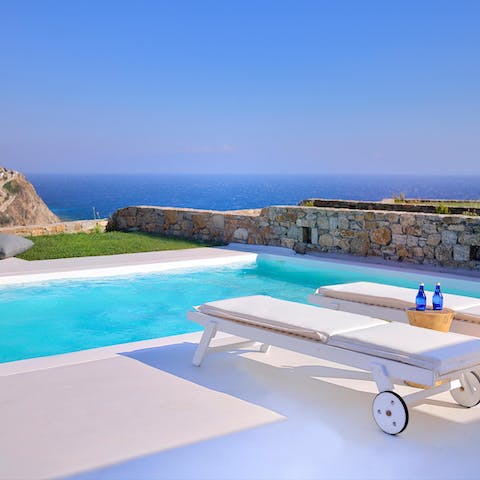 Swim in your private pool with sea views