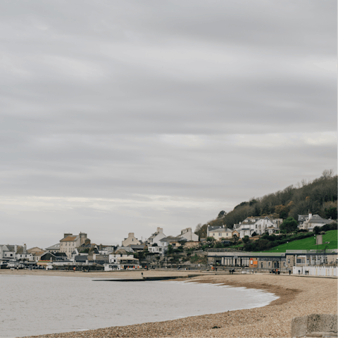 Stroll along the beach in charming Lyme Regis