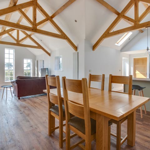 Share memorable meals around the wooden family-style table