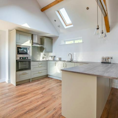 Whip up culinary feasts in the sleek and modern kitchen