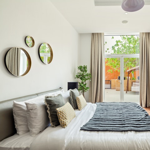 Pad straight out of bed and onto your private balcony with a morning coffee