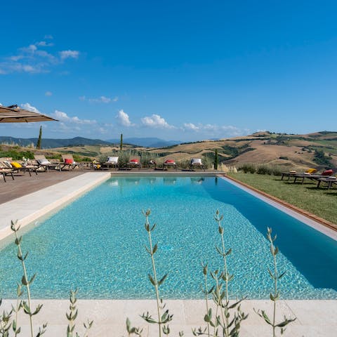 Swim laps in the long, turquoise pool