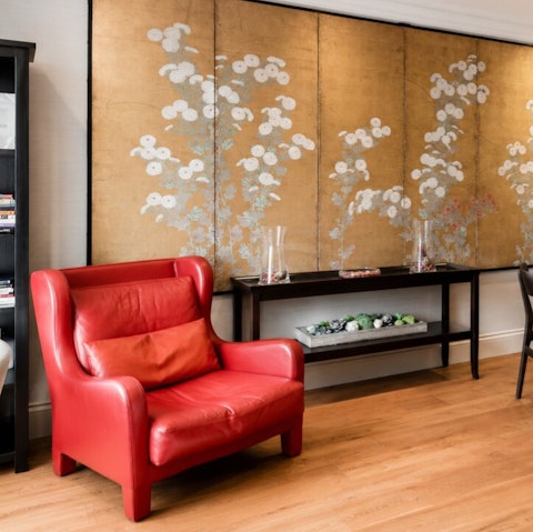 Settle back in an armchair in the refined living space