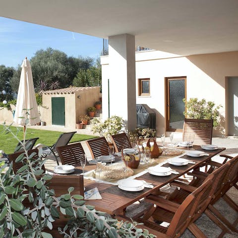 Dine alfresco on the private terrace as the sun sets, watching the sky glow from shades of amber to pink