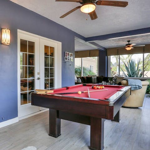 Gather the group for a bit of healthy competition around the pool table