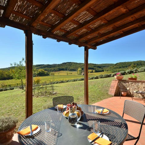 Enjoy your morning coffee with a view of the rolling Tuscan hills