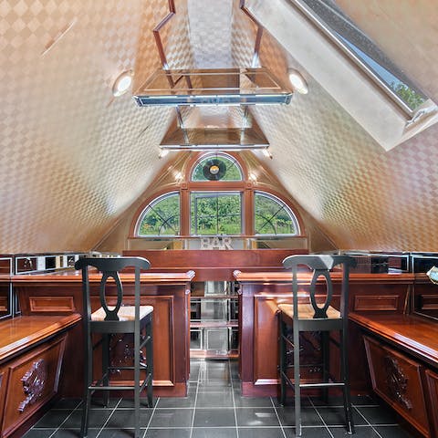 Head up to the "sky lounge" and make use of the wet bar