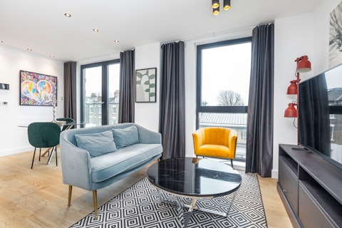 Sink into a velvet sofa bathed in natural light