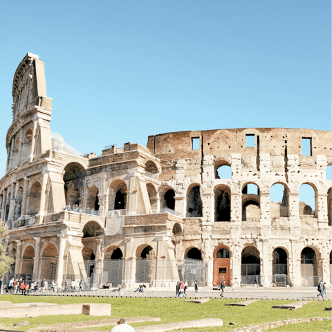 Visit the iconic Colosseum, a breezy six-minute walk away