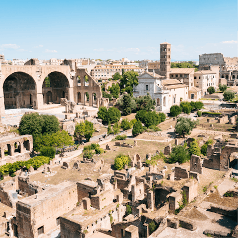 Explore the city's history through the ruins of the Roman Forum, a four-minute walk away