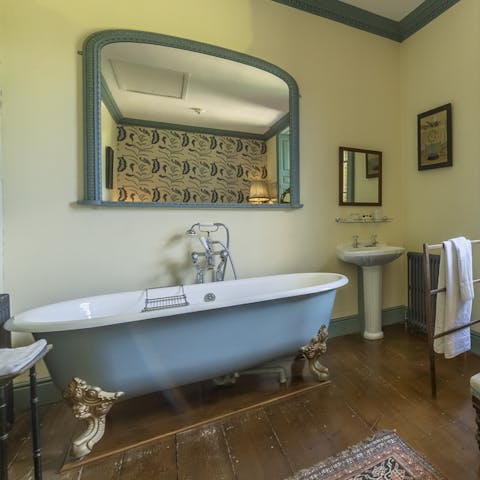 Unwind with a glass of wine in the clawfoot bathtub