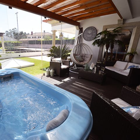 Soak away any stresses you might have left in the hot tub, or simply swing in the funky chair in this welcoming outdoor hangout