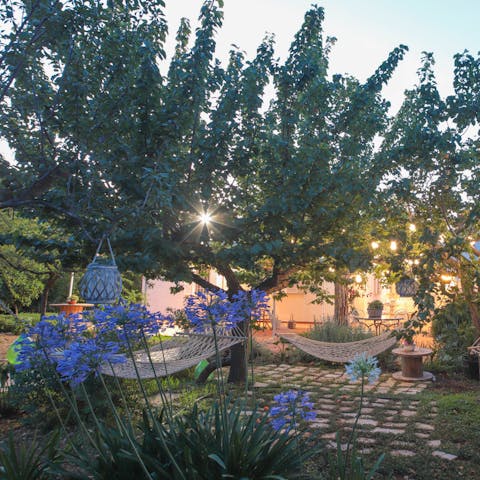 Enjoy a twilight glass of wine in the beautiful garden