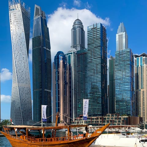 Visit Downtown Dubai, a ten to fifteen-minute drive away