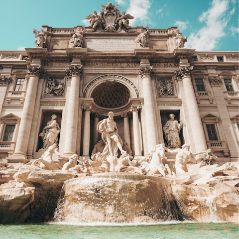 Begin your Roman Holiday with a stroll to the Trevi Fountain