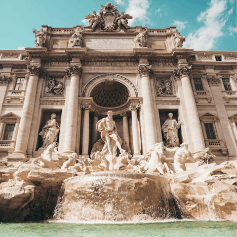 Begin your Roman Holiday with a stroll to the Trevi Fountain
