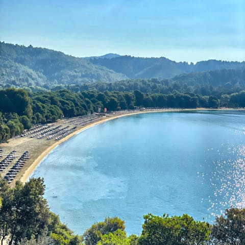 Relax on the sands of Megali Ammos beach, a four-minute walk away