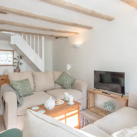 Enjoy a cosy night in under the wood beamed ceilings