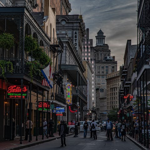 Explore lively Bourbon Street, a five-minute walk away