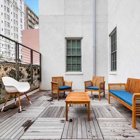 Catch some rays over a cool drink on the shared terrace