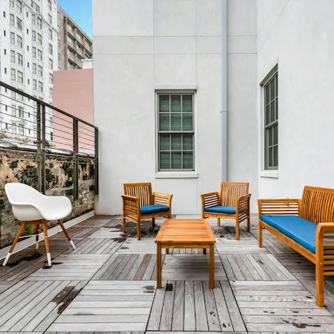 Catch some rays over a cool drink on the shared terrace