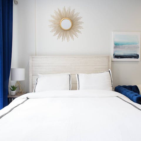 Wake up to Upper East Side views from the comfortable window-side bed