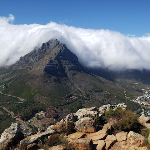 Discover the stunning beauty of Signal Hill and the nearby Lions Head Peak and Table Mountain