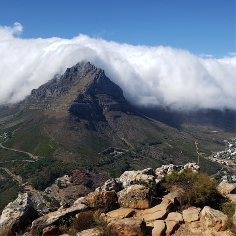 Discover the stunning beauty of Signal Hill and the nearby Lions Head Peak and Table Mountain