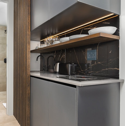 Whip up a quick snack in the capable and modern kitchenette