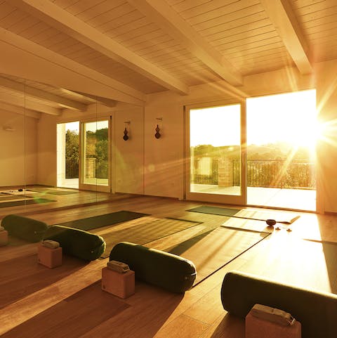 The sun streaming through the incredible yoga studio