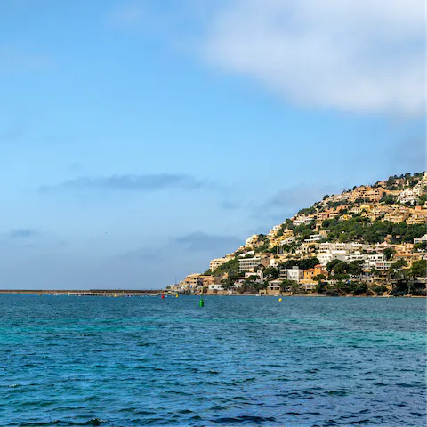 Spend the day swimming or paddle boarding off Platja des Geperut, a short walk away