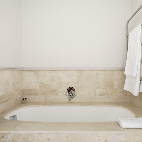 Treat yourself to a languorous session in one of the sunken bathtubs