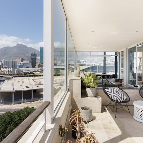 Relax on the large wraparound terrace and enjoy views of Table Mountain