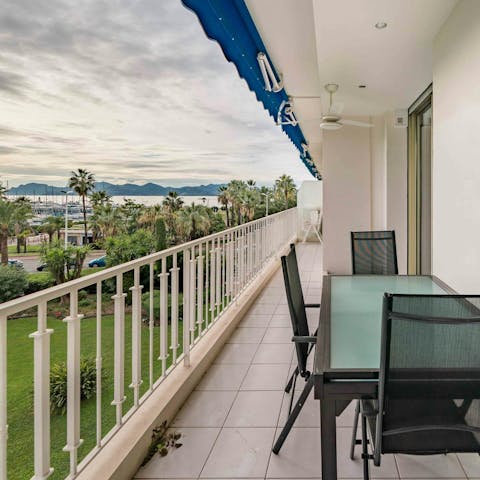 Admire stunning views of the Mediterranean Sea from the balcony