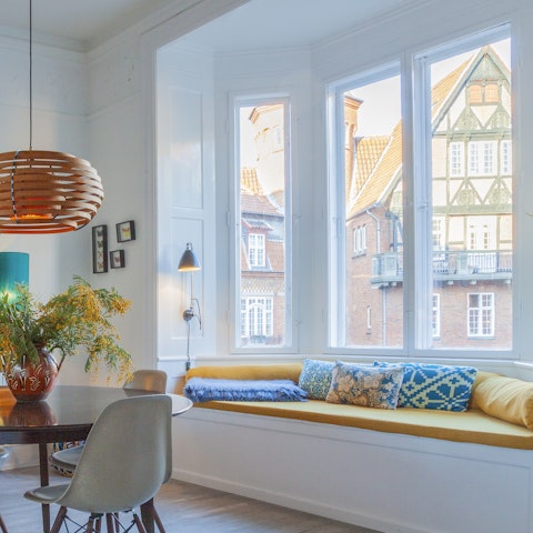 Admire views of the city centre from the cosy window seat