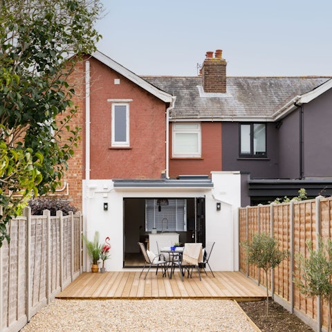 Enjoy a glass of wine in the private garden