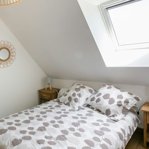 Get a restful night of sleep in the comfy bedroom