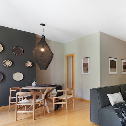 Share intimate meals around the mid-century-style dining table