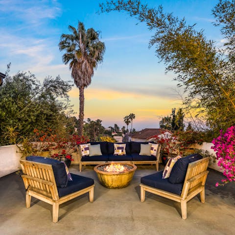 Gather around the fire pit as the sun sets over LA