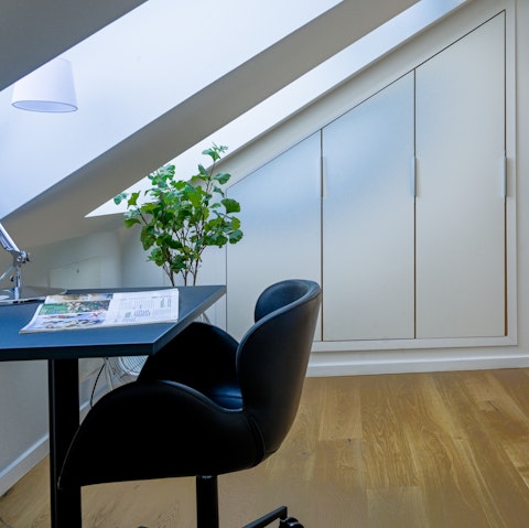 Get some work done at the desk under the eaves