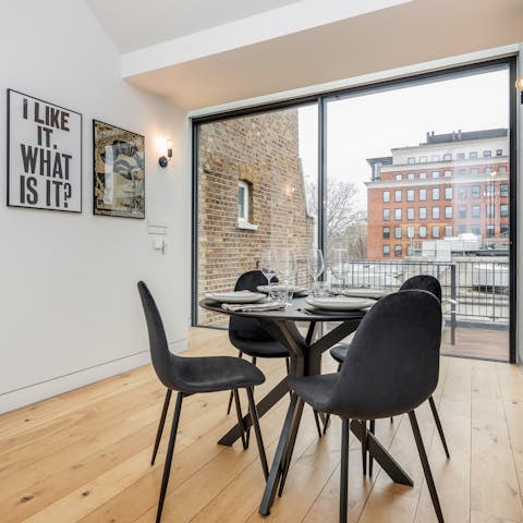 Gather together for a celebratory meal as you watch the light fade through the floor-to-ceiling windows