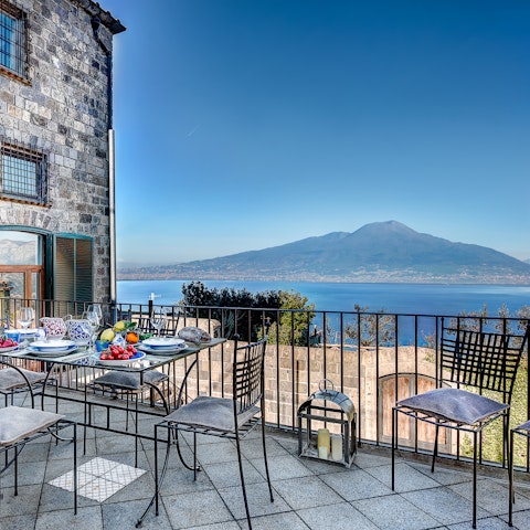Dine alfresco with a view of Mount Vesuvius