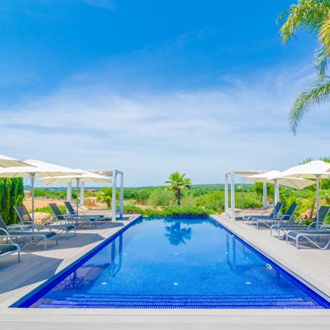 Spend the day splashing in the pool overlooking the fields