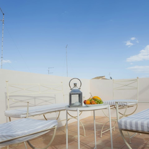 Dine or unwind on the rooftop terrace