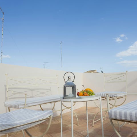 Dine or unwind on the rooftop terrace