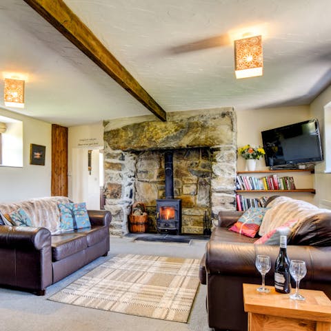 Spend evenings in front of the fire watching films or playing games